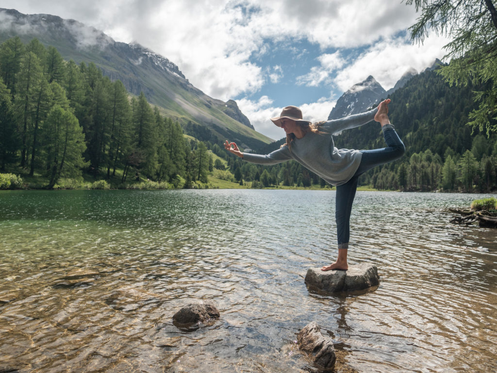 Free Breathing Meditation Guide Young Woman Exercises Yoga On Rock Above Lake